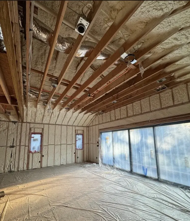 Interior walls and ceiling insulated with spray foam during new construction in Upper Macungie